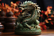 Carved Green Wooden Dragon Figurine On Dark Background