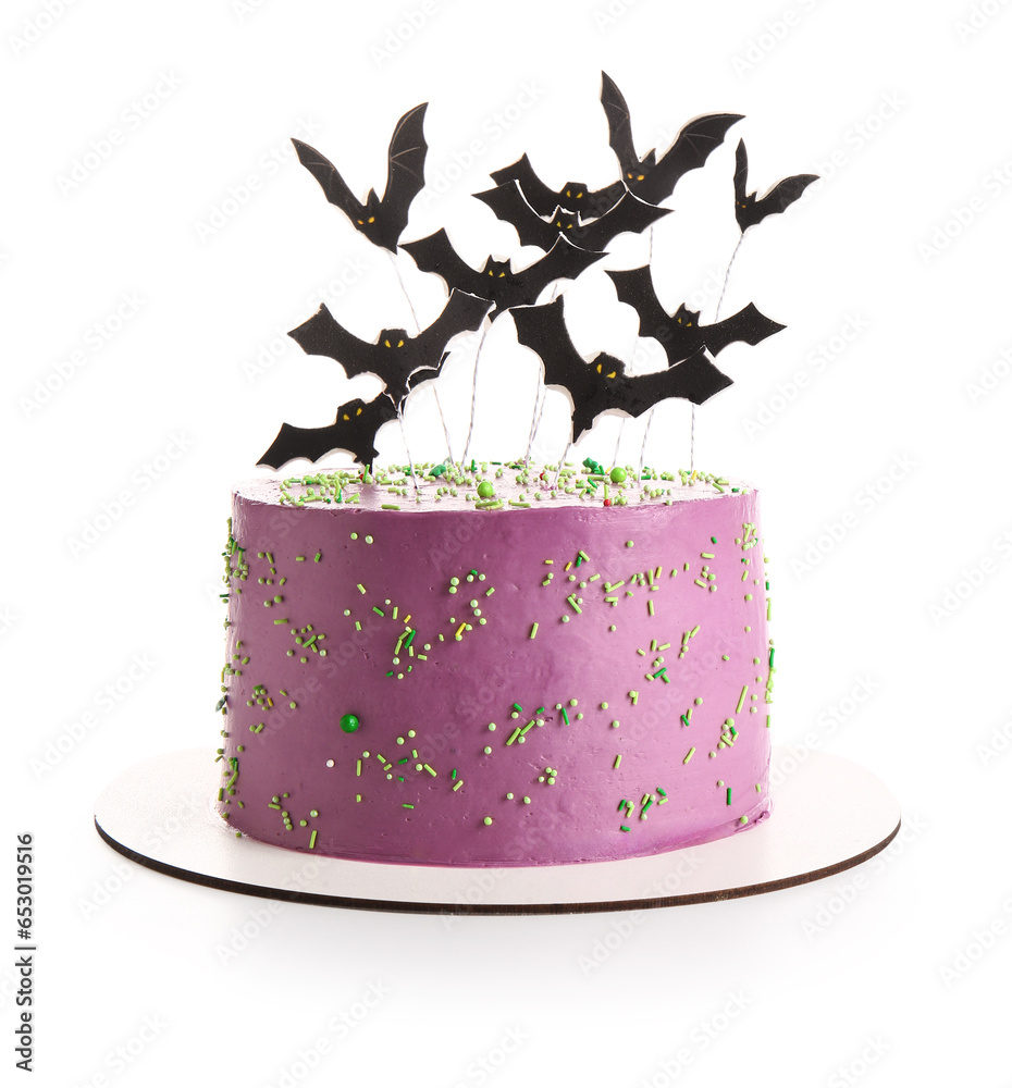 Tasty cake decorated for Halloween on white background