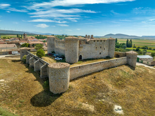 Canvas Print - Aerial view of medieval Almenar castle near Soria Spain, four round towers protect the inner courtyard, surrounded by fortified outer walls