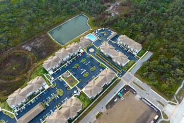 Wall Mural - Top view of new apartment condos in Florida suburban area. Family housing in quiet neighborhood. Real estate development in american suburbs