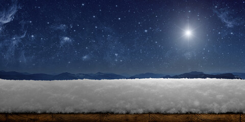 a winter Christmas background with snow on the wood
