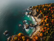 Top view  of an ocean coast with forset at autumn.