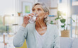 © Wesley JvR/peopleimages.com - Wellness, home or healthy old woman drinking water for healthcare or natural vitamins in a house. Retirement, elderly relaxing or thirsty senior person refreshing with liquid for energy or hydration