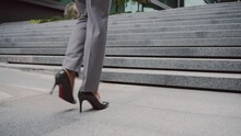 Businesswoman In High Heels Walking Stairs Outdoors
