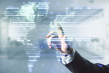 Poster - Man hand clicks on abstract creative digital world map on blurred office background, globalization concept. Multiexposure