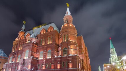 Wall Mural - The State Historical Museum of Russia, stands as a luminous beacon between Red Square and Manege Square in Moscow. Night timelapse hyperlapse showcases the museum's architectural grandeur