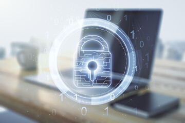 Poster - Double exposure of creative lock hologram with chip and modern desktop with laptop on background. Information security concept