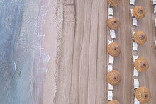 Drone View Of Beach Straw Umbrellas On An Empty Beach, Sicily, Mediterranean Sea, Italy