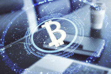 Poster - Double exposure of creative Bitcoin symbol with modern laptop on background. Cryptocurrency concept