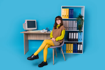 Aufkleber - Full length photo of cheerful positive woman dressed knitted waistcoat eyewear working office obsolete gadget isolated blue color background