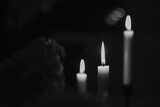 Fototapeta  - Płomienie świec, wspomnienie wszystkich świętych, 1 listopad. Candle flames, commemoration of all saints, November 1.