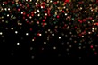 falling golden red green metallic glitter foil confetti on black background, gold holiday and festive Christmas background.