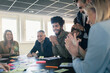© Johnér - Group of business people during meeting in office