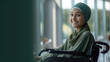 © tong2530 - Happy female cancer patient wearing head scarf in wheelchair at hospital. Generative Ai