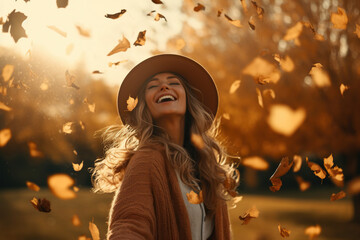 Wall Mural - A youth woman in autumn leaf's around her