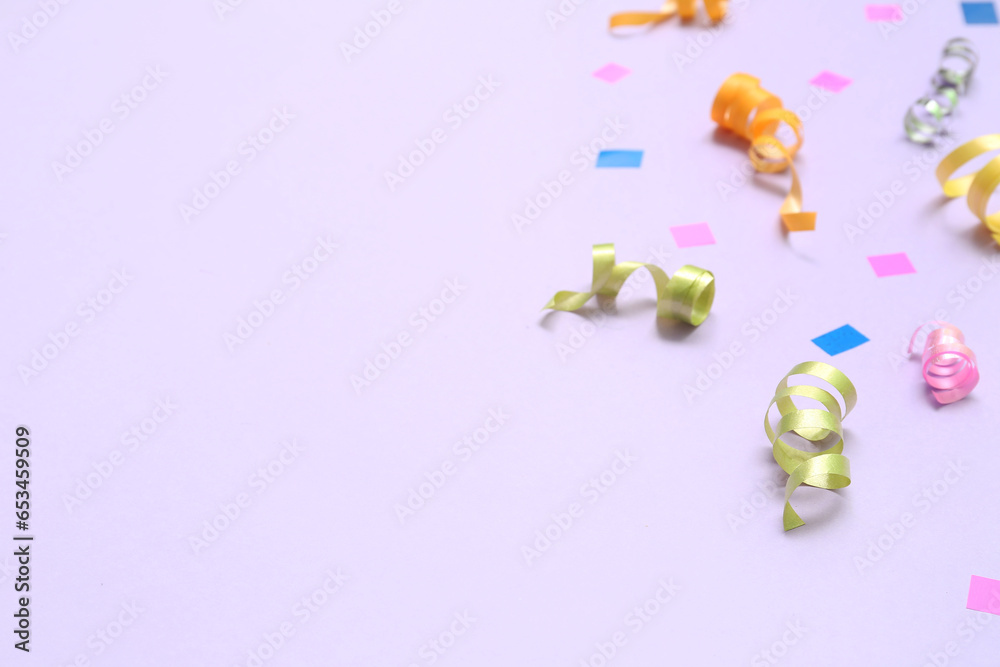 Colorful on confetti on lilac background