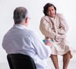 © Elnur - Aged male doctor psychiatrist examining young patient