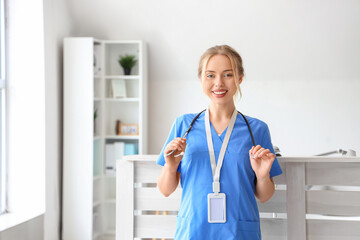 Sticker - Female medical intern with stethoscope in clinic