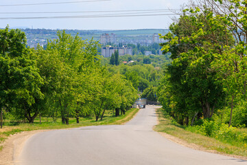 Wall Mural - Nice rural road. Background with selective focus and copy space