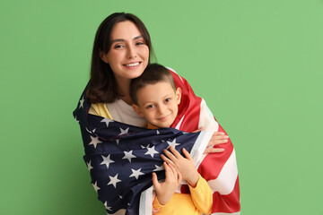 Sticker - Little boy and his mother with USA flag hugging on green background. Veterans Day celebration