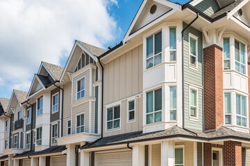 Wall Mural - New Modern Apartment Buildings in Vancouver BC. Canadian modern residential architecture. New townhouses with garages