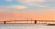 Chesapeake Bay Bridge with blue and orange sunset