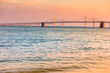 Chesapeake Bay Bridge and water at beautiful orange and blue sunset