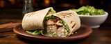 This wellcomposed image highlights a sctious Chicken Caesar Wrap, b with juicy grilled chicken, vibrant greens, nutty Parmesan shavings, and a velvety Caesar dressing, elegantly wrapped
