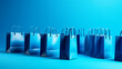 Blue shopping bags on blue background. AI generated