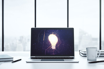 Poster - Modern computer monitor with creative light bulb hologram, research and development concept. 3D Rendering