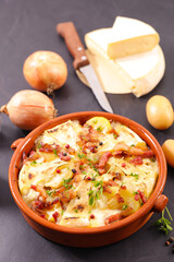 Canvas Print - french traditional tartiflette-baked potato, cheese and bacon