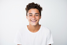Portrait Of Smiling Teenager On White Background