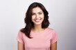 © Madhulatha - woman with pleasant smile, dark hair, dressed in casual pink t-shirt, white background