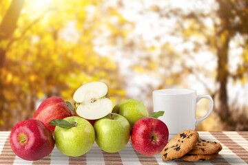 Canvas Print - Autumn picnic. Cup of coffee, fresh apple and cookies