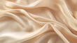 Beige cream vanilla light brown silk satin fabric. Soft wavy folds in the fabric. Wedding, anniversary, valentine, love, tender. Beautiful abstract background with space for your design. 