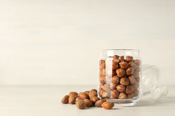 Wall Mural - Healthy food and healthy nutrition concept, nuts - hazelnut