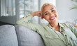 © Malambo C/peopleimages.com - Happy, woman and portrait at home of freelancer relax with a smile on a living room couch. Female person, calm and thinking in a house with remote work break and rest on a lounge sofa with peace