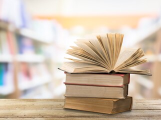 Wall Mural - Book with opened old pages in library.