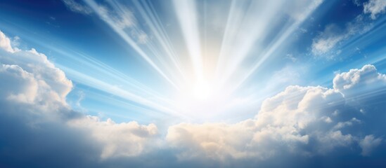 Wall Mural - beautiful sunlight breaking through the hazy clouds in the sky