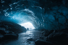 Generative AI Illustration Of View Anonymous Alpinist Tourist Standing An Ice Tunnel