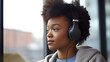 african descendant girl listening to music with headphones