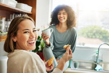 Poster - Happy, portrait and a lesbian couple with breakfast in the kitchen for eating, hungry and coffee. Smile, house and gay or lgbt women with food, drink and laughing together for lunch in the morning