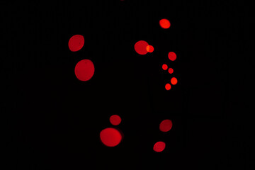 Canvas Print - bokeh, red particles and lights on black background with pattern, texture and mockup with cosmic aes
