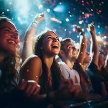 Crowd Of Young People Partying In A Night Club, People Having Fun, Smiling, Sparks, Hyped Up