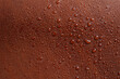 water drops on red brown leather texture, soft focus close up