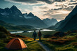 A couple hiking and camping with a tent in the mountains. Sustainable travel concept enjoying nature
