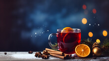 Christmas Mulled Red Wine With Spices And Fruits On A Blue Background. Traditional Hot Drink At Christmas Time