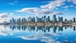 Serene waterfront cityscape with reflections in water