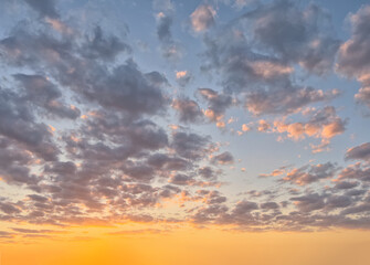 Wall Mural - golden hour sky with clouds. ideal for sky replacement in modern photo editing software tools.