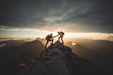 Fototapeta  - Two climbers manage to ascend to the summit of a mountain sunset,after hard teamwork,reaping the rewards of collaboration to achieve common goals and accomplishments, attaining success through effort 